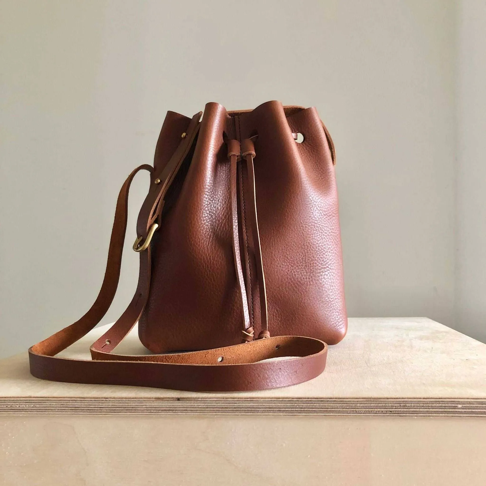 Nomad Mini Leather Bucket Bag in Black or Tan